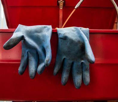 Gloves on parts washer